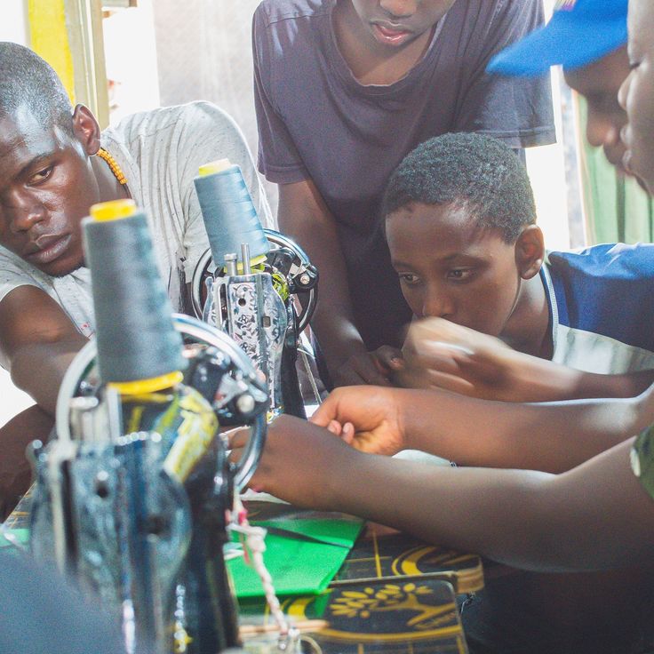 Group of students working on tailoring projects